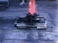 Top of charcoals that piled up are burning.