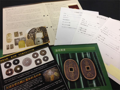 Photo of pamphlets on old coins and order forms
