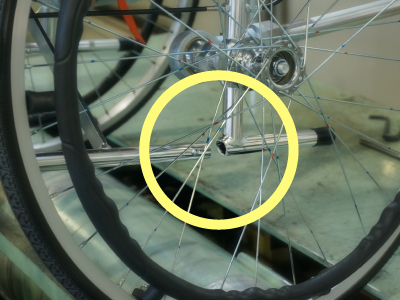 Frame near the left rear wheel snapped off during the running durability test in accordance with JIS