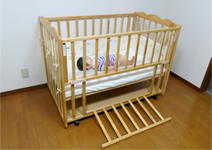 a scene from the video of a test simulating a possible accident [wooden crib]