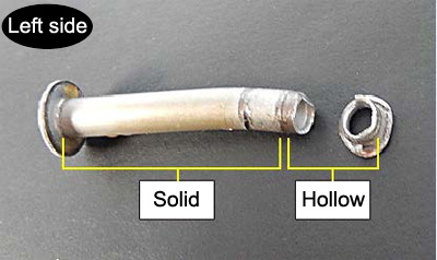 Photo showing solid and hollow parts of the rivet on the left side of the product under complaint.