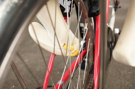 Photo of an area between heel and Achilles tendon trapped in the wheel.