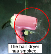 Photo of a scene when the hair dryer has smoked