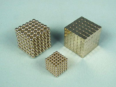 Photo of different shapes and sizes of magnetic balls and cubes